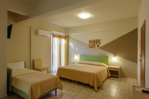 Postel nebo postele na pokoji v ubytování Park Hotel