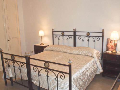 Ένα ή περισσότερα κρεβάτια σε δωμάτιο στο Villa Palmira