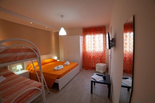 Кровать или кровати в номере B&B Miramare Suite