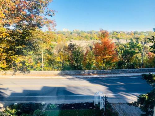 an autumn view of a road with fall foliage at Redwood Bed and Breakfast in Niagara Falls