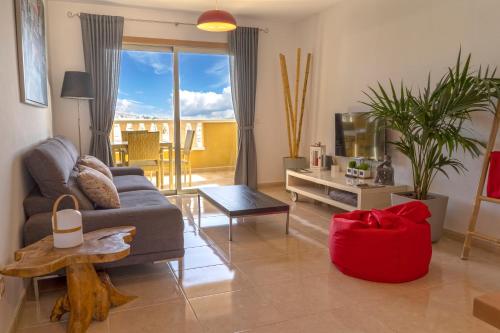 La Perla Beach Apt with Pool