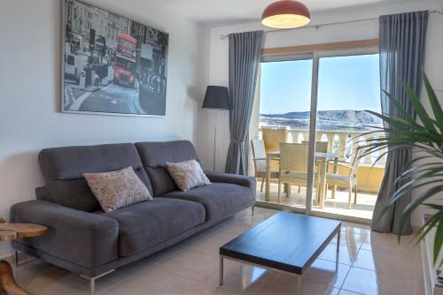 La Perla Beach Apt with Pool