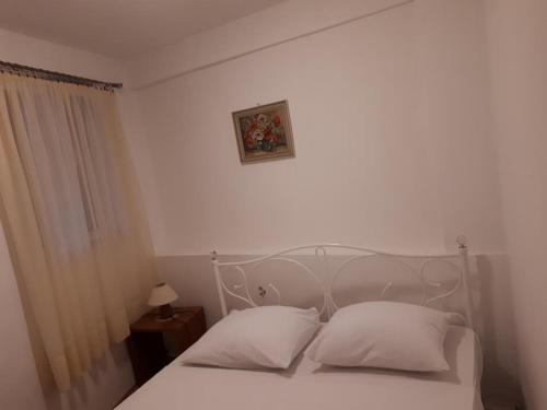 Posteľ alebo postele v izbe v ubytovaní Apartments Vito - 10 m from sea