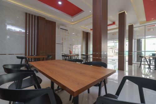 Φωτογραφία από το άλμπουμ του RedDoorz Plus at Grand Tara Homestay Palembang σε Παλεμπάνγκ