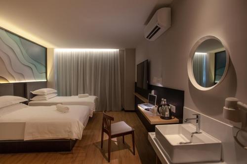 Postel nebo postele na pokoji v ubytování HAKO HOTEL (MOUNT AUSTIN)