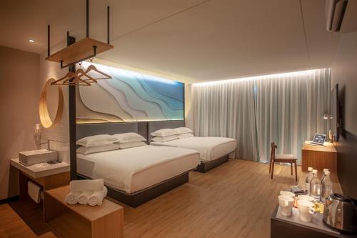Cama o camas de una habitación en HAKO HOTEL (MOUNT AUSTIN)