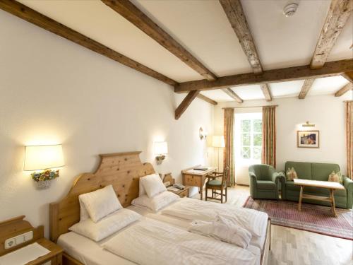 Postel nebo postele na pokoji v ubytování Hotel Tiefenbrunner