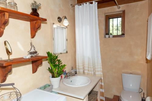Kylpyhuone majoituspaikassa Oceanis cottage house