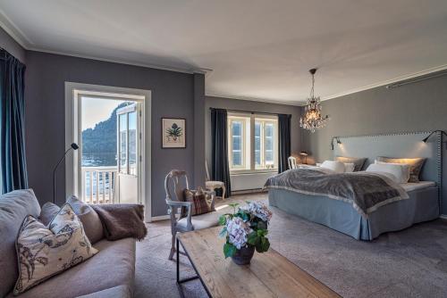 Katil atau katil-katil dalam bilik di Angvik Gamle Handelssted - by Classic Norway Hotels