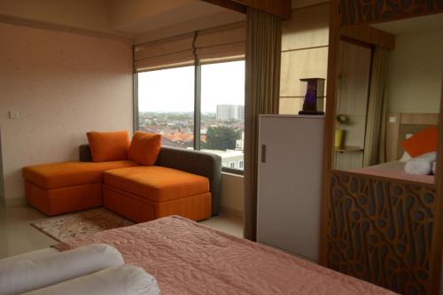 Ένα ή περισσότερα κρεβάτια σε δωμάτιο στο The Cabin Apartment Uttara