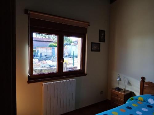 Postel nebo postele na pokoji v ubytování Apartamentos La Regata