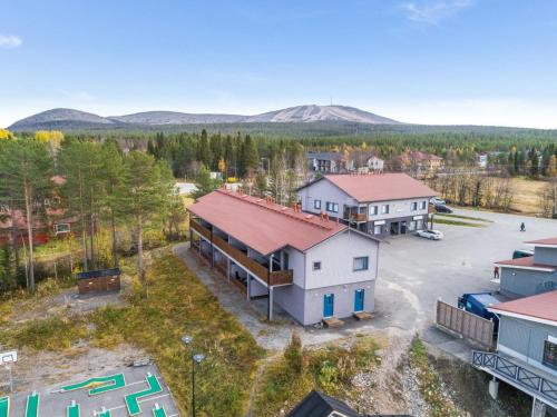 an aerial view of a house with a parking lot at Holiday Home Hil-lak-ka 4 by Interhome in Äkäslompolo