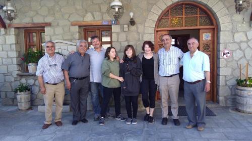 a group of people standing in front of a building at Hotel Victoria in Metsovo