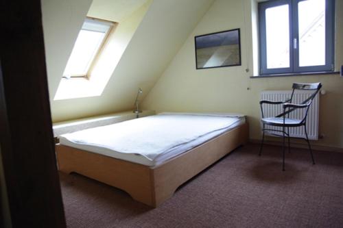 En eller flere senge i et værelse på Große Wohnung / Haushälfte in Peetzig am See