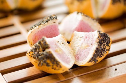 a close up of a piece of bread with seeds at Sakura Terrace in Kyoto