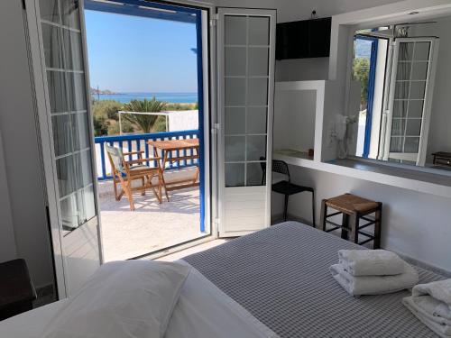 Postel nebo postele na pokoji v ubytování Deep Blue Rooms & Apartments