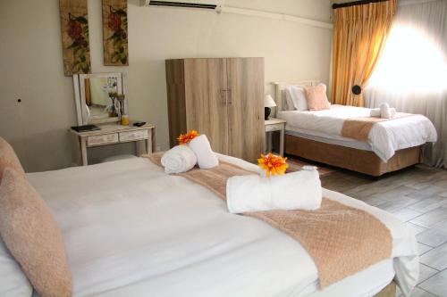 Katil atau katil-katil dalam bilik di Belle Vue Guesthouse