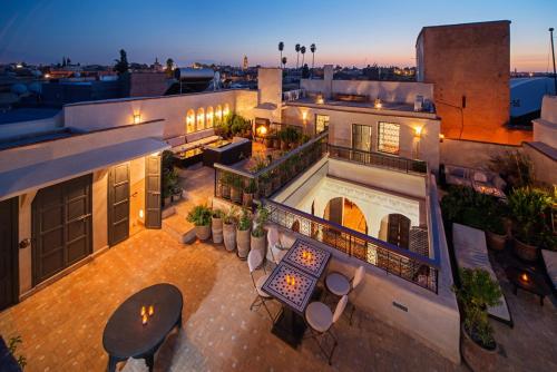 an aerial view of a building with a patio at Riad Star by Marrakech Riad in Marrakesh