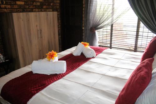Katil atau katil-katil dalam bilik di Belle Vue Guesthouse