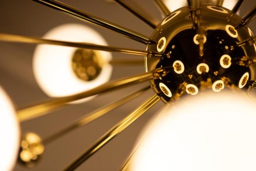 a close up of a ceiling fan at Amsterdam Plaza Hotel & SPA in Palanga
