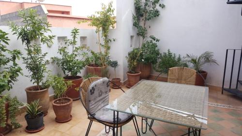 Un balcón o terraza en Riad Medina