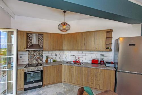 Dapur atau dapur kecil di Platanias Villa Spyros