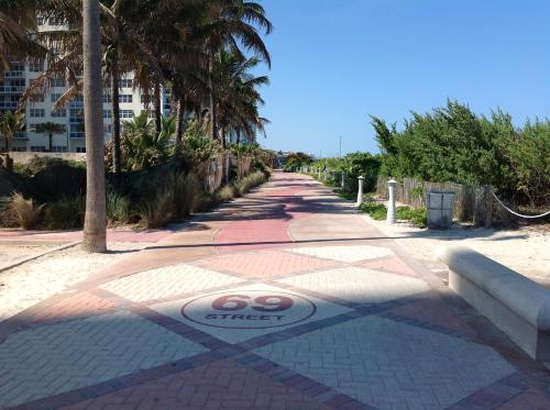 a street with a stop sign on the road at Harding Boutique Apartments in Miami Beach