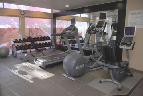 a gym with several treadmills and elliptical machines at Holiday Inn Express Boise Downtown by IHG in Boise