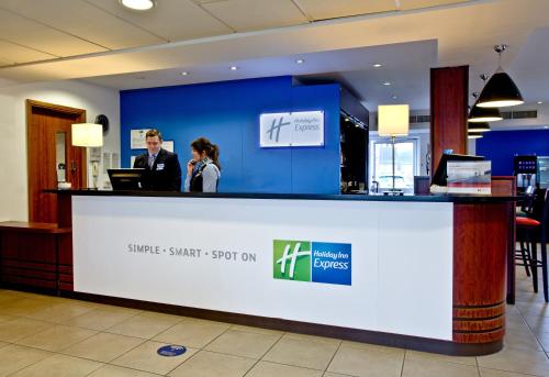 a large room with a large sign on the wall at Holiday Inn Express Shrewsbury, an IHG Hotel in Shrewsbury
