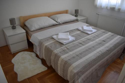 Postel nebo postele na pokoji v ubytování Apartman BoNi