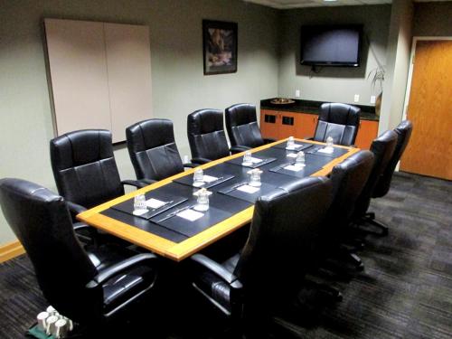 a conference room with a large table and chairs at Holiday Inn Express & Suites Bozeman West by IHG in Bozeman