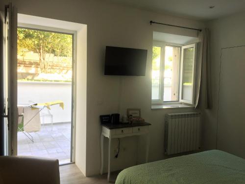 TV a/nebo společenská místnost v ubytování B&B MonteCengio