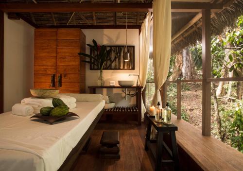 Postel nebo postele na pokoji v ubytování Inkaterra Hacienda Concepcion
