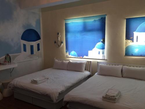 Una cama o camas en una habitación de Greece Mediterranean B&B