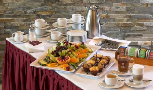 a table with a tray of food on a table at Hotel Löwengarten in Speyer