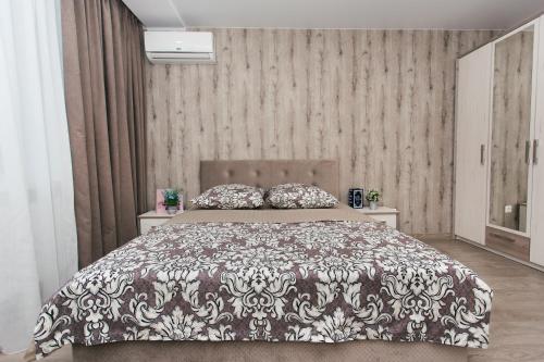 Ένα ή περισσότερα κρεβάτια σε δωμάτιο στο Luxury apart-hotel near Lavina New Building 9 floor