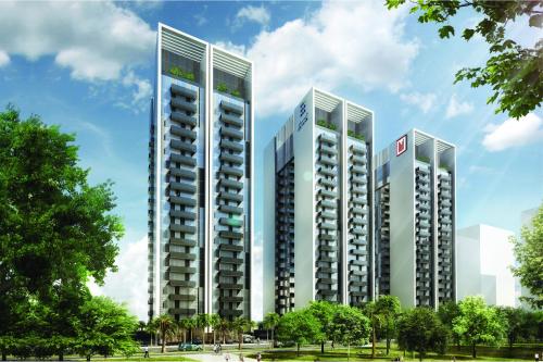 a rendering of three tall buildings in a park at Millennium Executive Apartments Mont Rose in Dubai