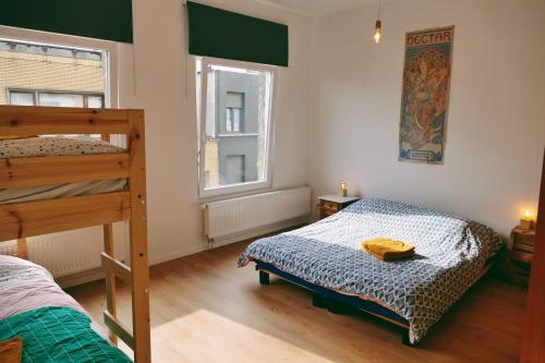 En eller flere senge i et værelse på 130sqm appartment with 20sqm terras and free parking