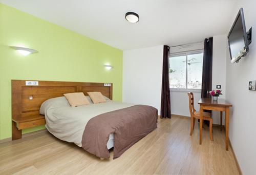 Katil atau katil-katil dalam bilik di Hotel Etchoinia