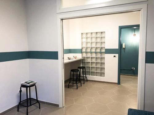 Kuchyň nebo kuchyňský kout v ubytování Hostellino