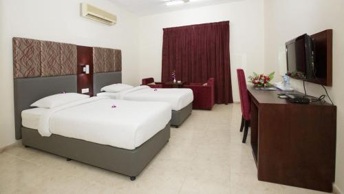 Krevet ili kreveti u jedinici u objektu Samara Hotel