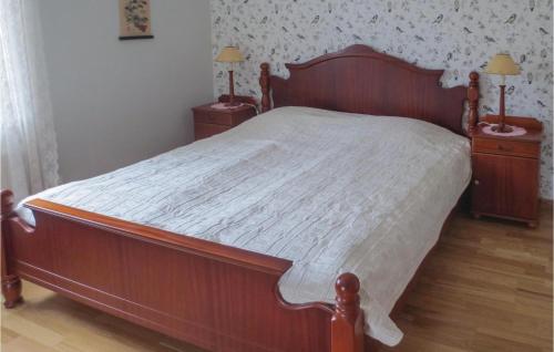 Кровать или кровати в номере Four-Bedroom Holiday Home In Gnosjo