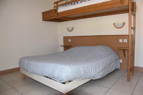 Postel nebo postele na pokoji v ubytování Hotel Gai Relais