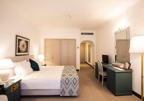 Ένα ή περισσότερα κρεβάτια σε δωμάτιο στο Hotel Karia Princess