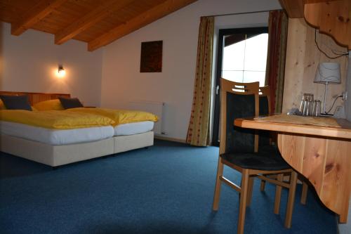 Postel nebo postele na pokoji v ubytování Gästehaus Wöll
