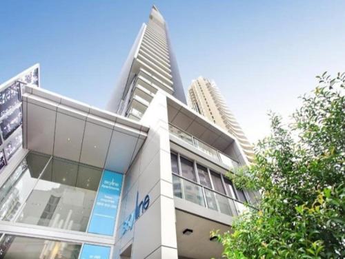 a building with two tall buildings in the background at SK1 - 2 level 2 Bedroom Skyline SkyHome in Brisbane