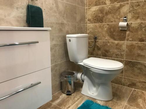 Vonios kambarys apgyvendinimo įstaigoje LUX & Comfort