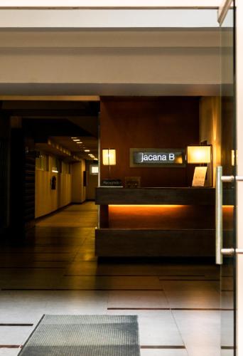 a hallway in a building with a sign on the wall at Pico de Loro Cove Hamilo Coast, Apartment 519, Corner Studio Unit, Jacana B Condominium in Nasugbu