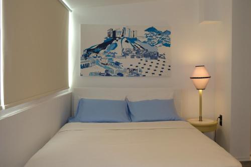 A bed or beds in a room at STUDIO ANASTASIA