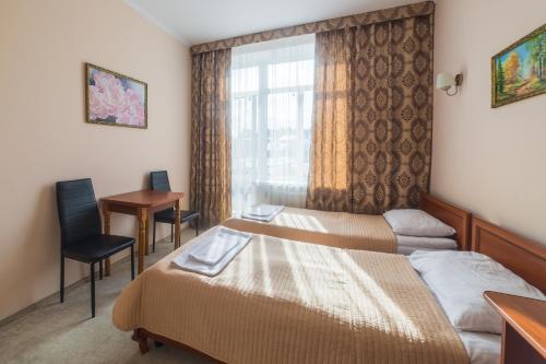 Posteľ alebo postele v izbe v ubytovaní Villa Zhanna
